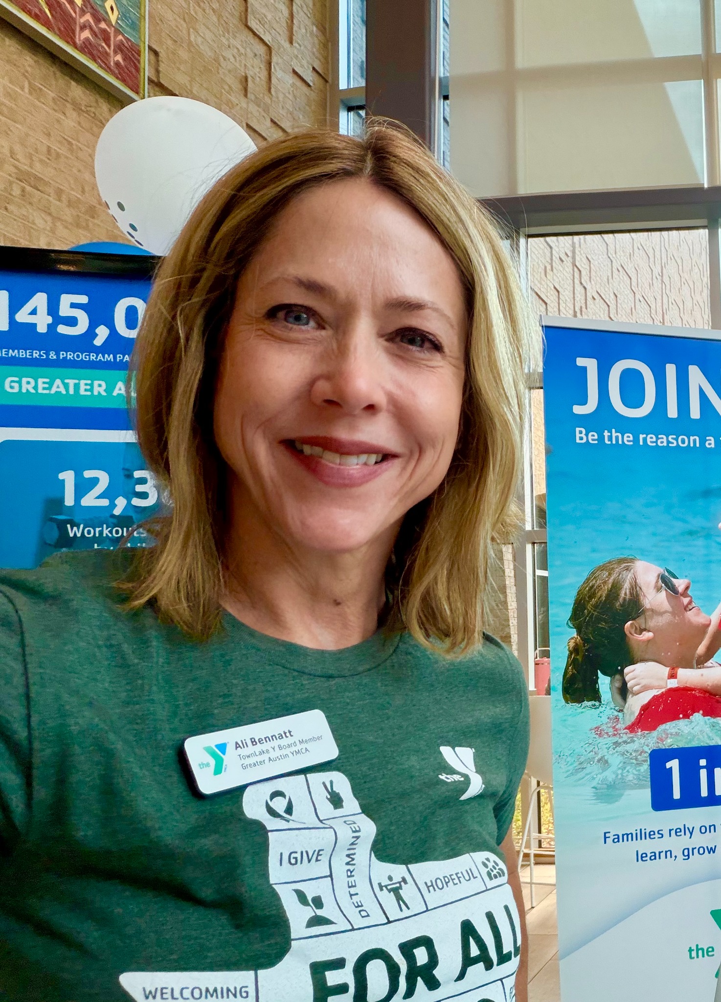 Ali participating in a community event with the TownLake YMCA